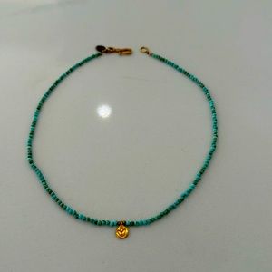 Lotus flower charm, real turquoise.